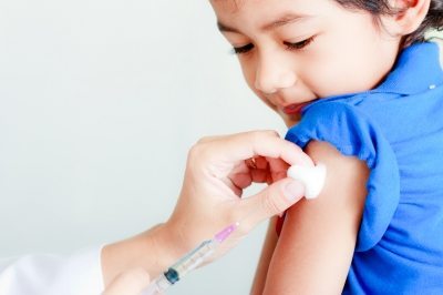 Boy receiving injection